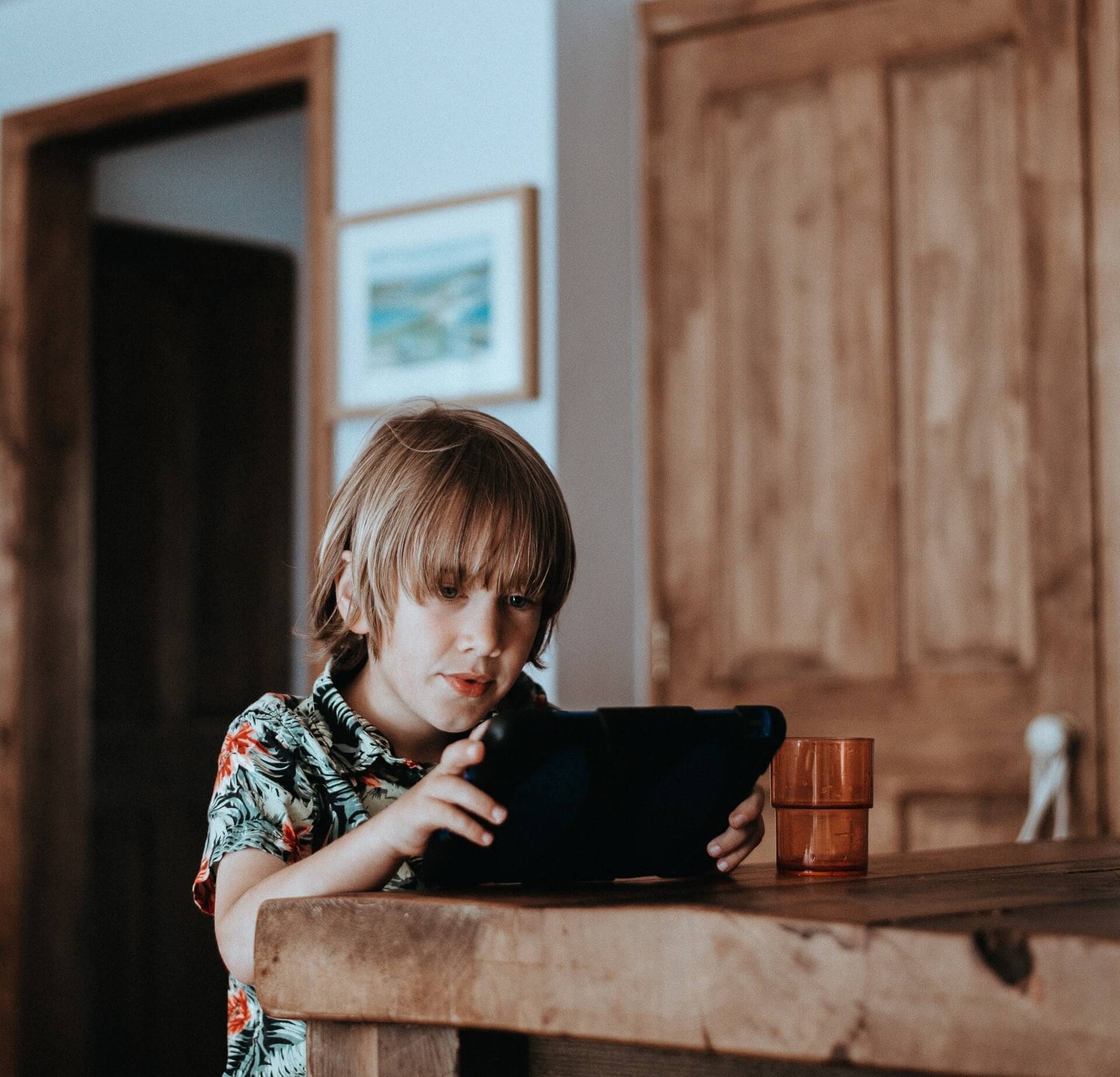 kid using tablet