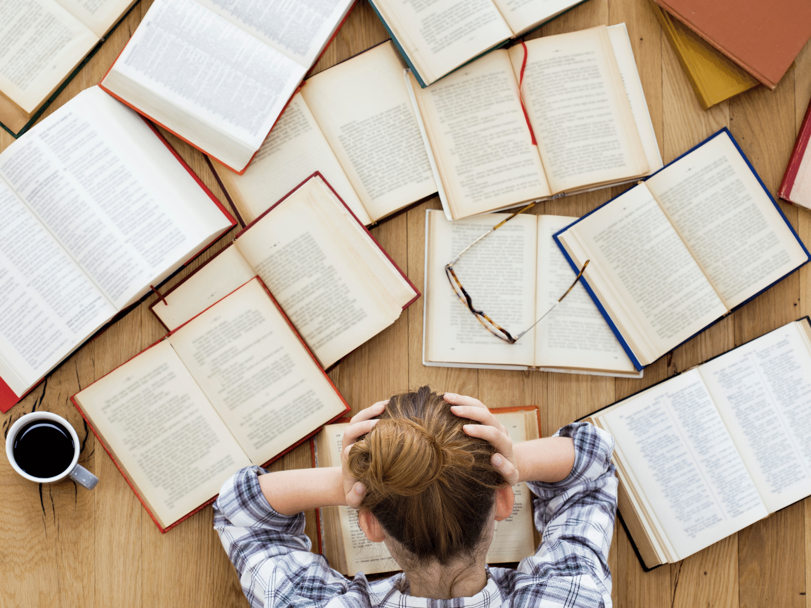 books spread out on desk