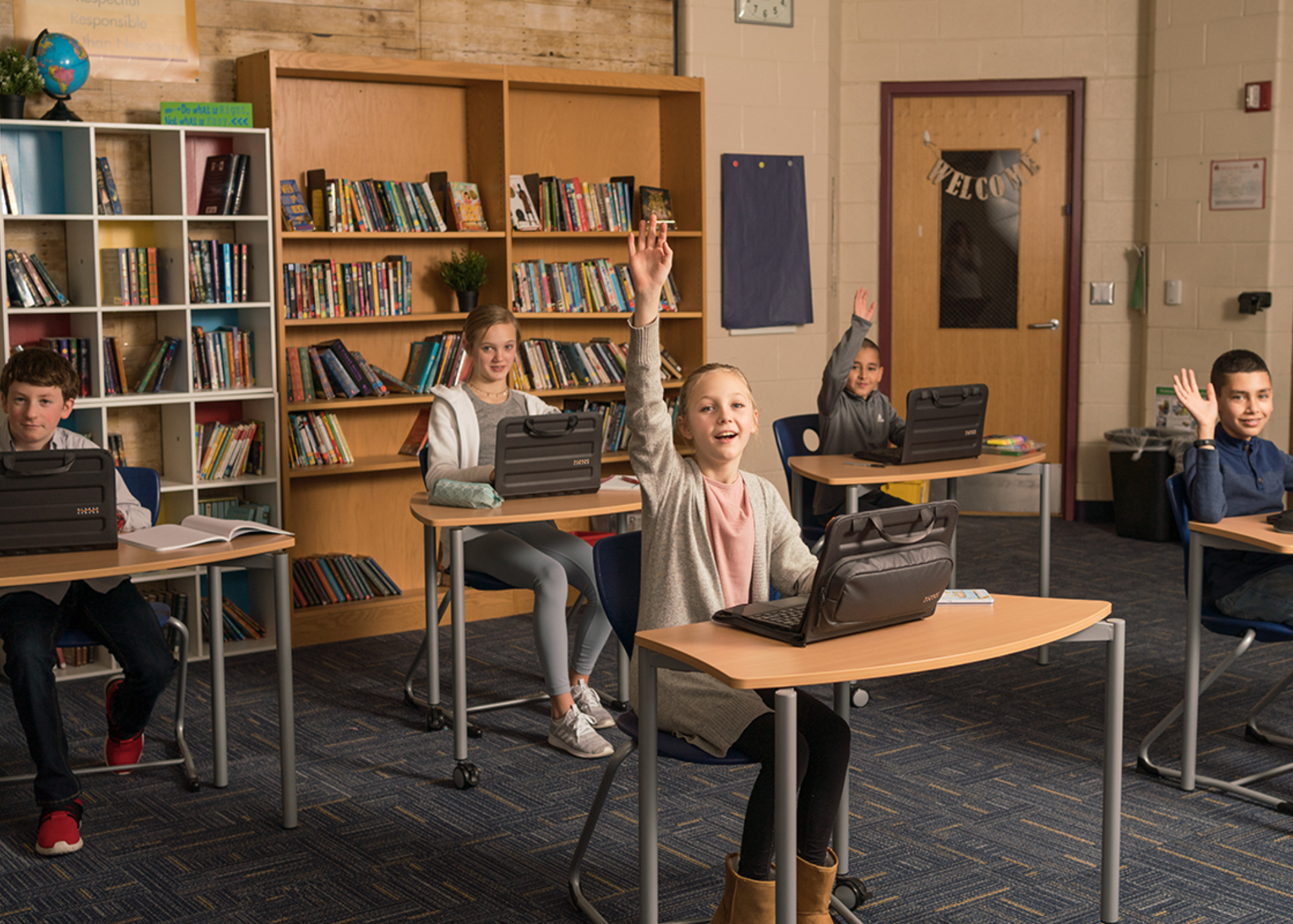 students raising hands in classroom with higher ground cases