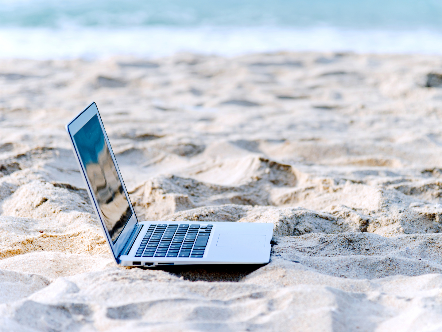 laptop on beach