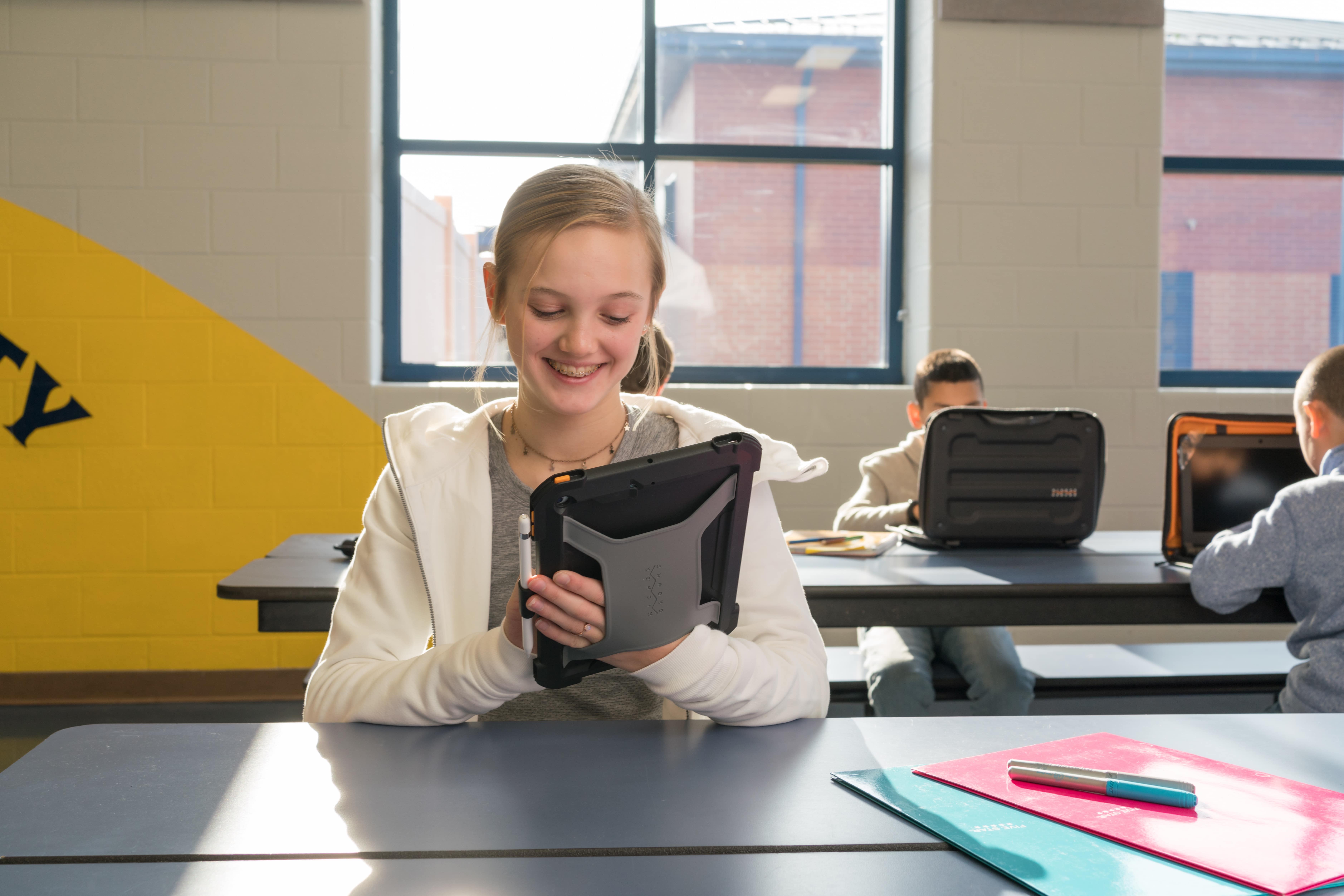 student using higher ground protex apple ipad case