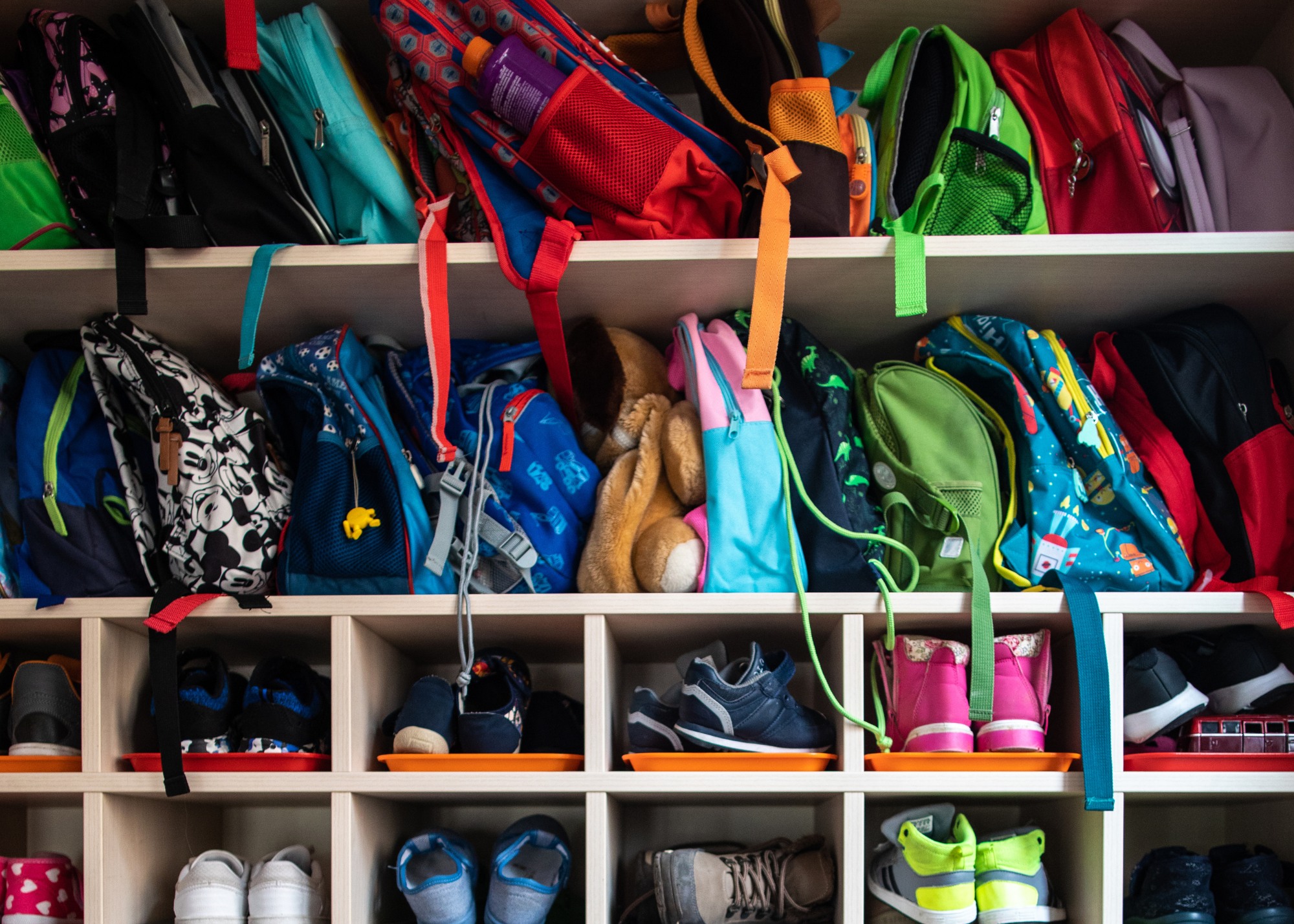 storing student backpacks in cubbies