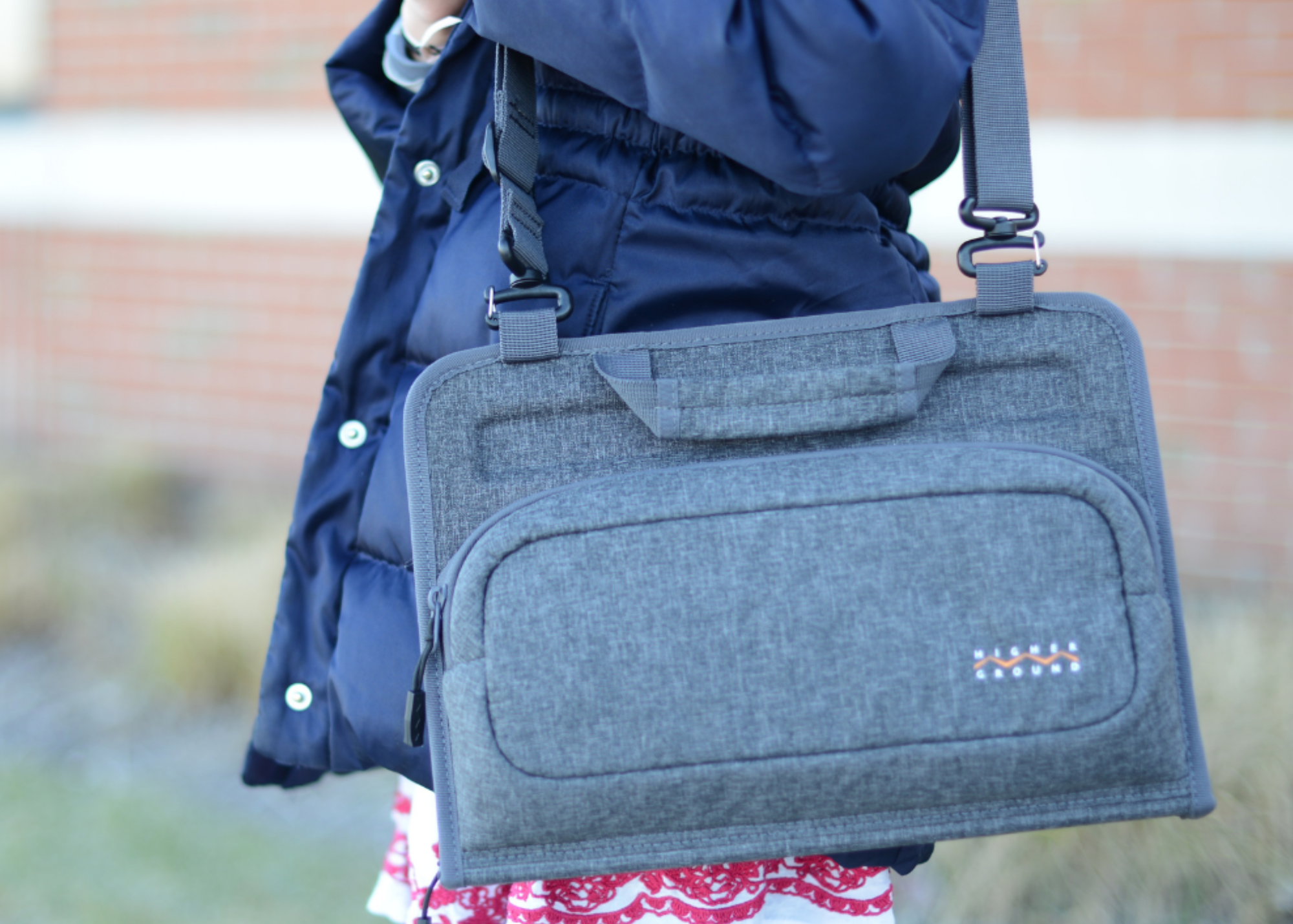 student carrying datakeeper plus cut & sew case